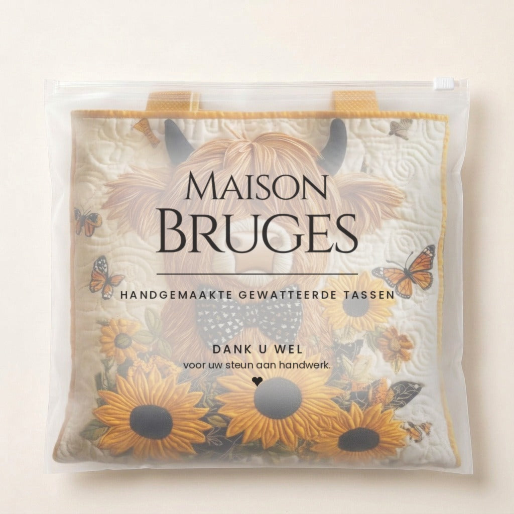 Hooglander & Zonnebloemen Gewatteerde Tas in de verpakking van Maison Bruges