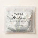 White Lilies quilted tote bag in its Maison Bruges pouch